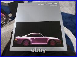 A 1986 Porsche 959-Art & Car-, Limited Edition Book With Coin & 959 Sales Brochure