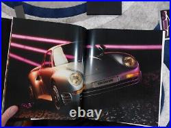 A 1986 Porsche 959-Art & Car-, Limited Edition Book With Coin & 959 Sales Brochure